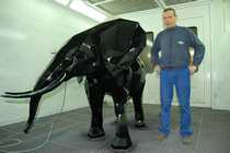 Sculpture for artist.  Model of the elephant with facets paints in black.