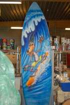  Decorations for amusement park: giant board of surfing.
