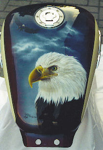 Painting personalized on tank: sea eagle with white head on cloudy gray sky.